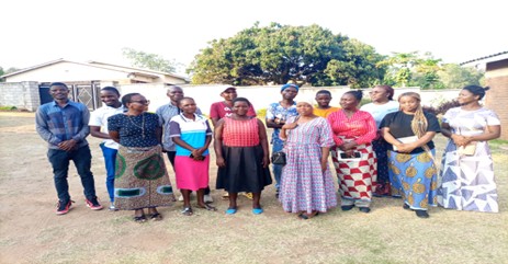 Smiling Group Photo Of Participants After A Successful Training